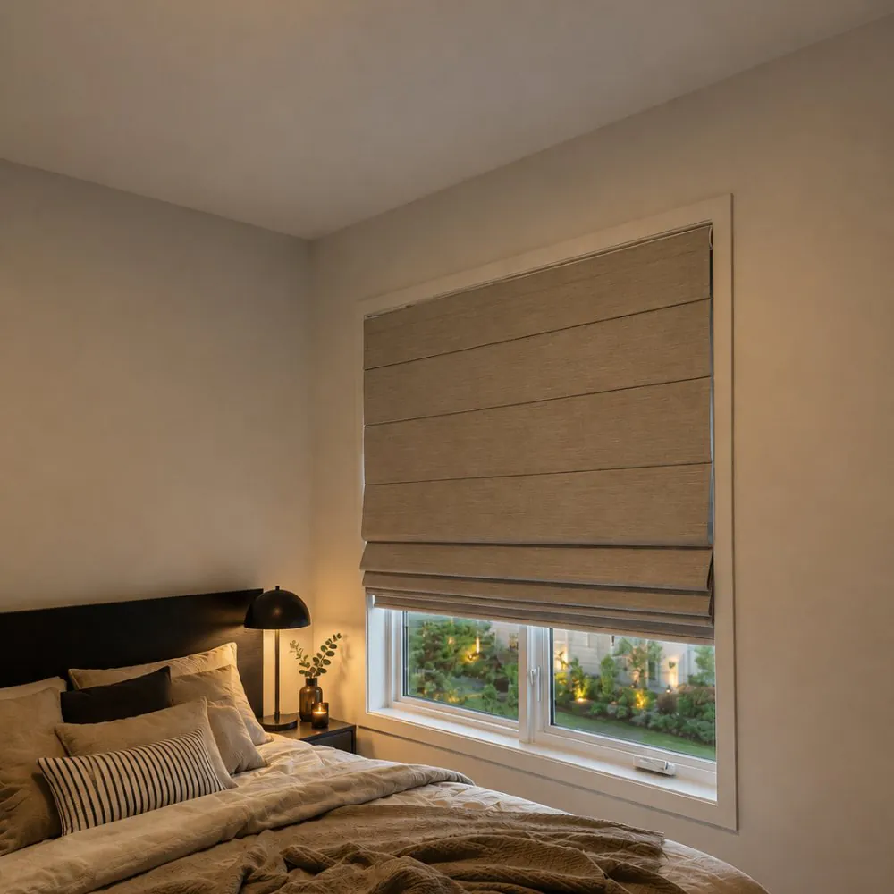 A linen Roman shade in a calm bedroom