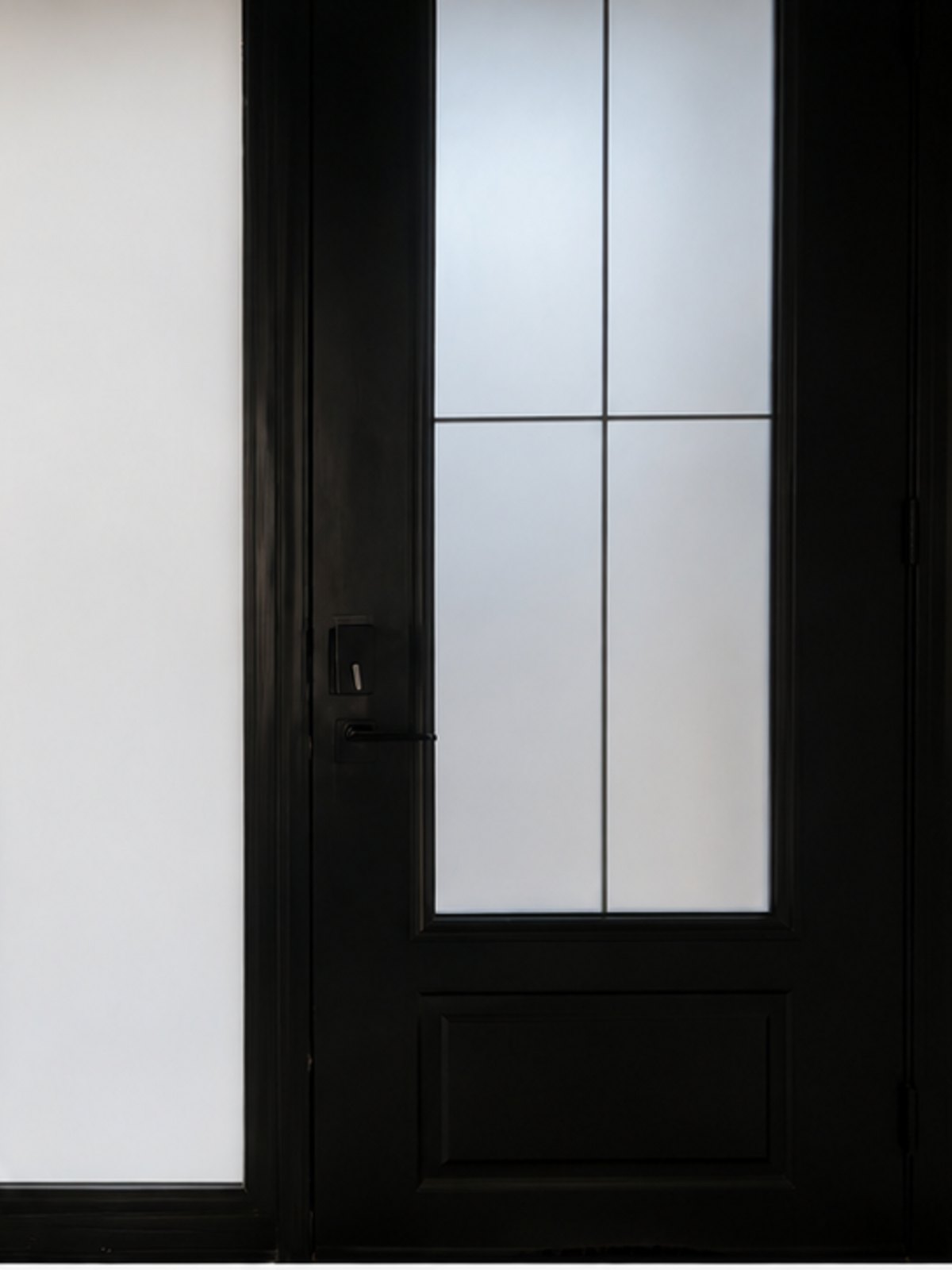 Smart film on a front-door sidelight, switched to frosted for privacy