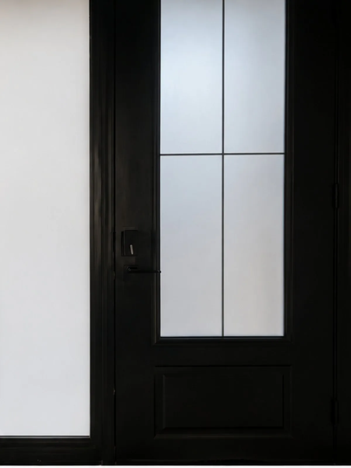 Smart film on a front-door sidelight, switched to frosted for privacy